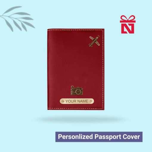 Luxury red passport cover personalized with name and charm detail – travel in style with a personal touch
