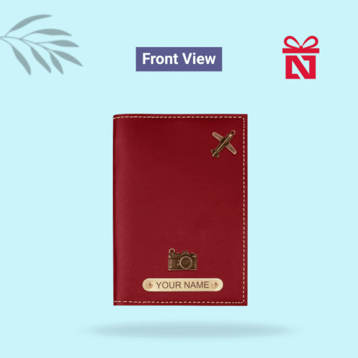 Luxury red passport cover personalized with name and charm detail – travel in style with a personal touch